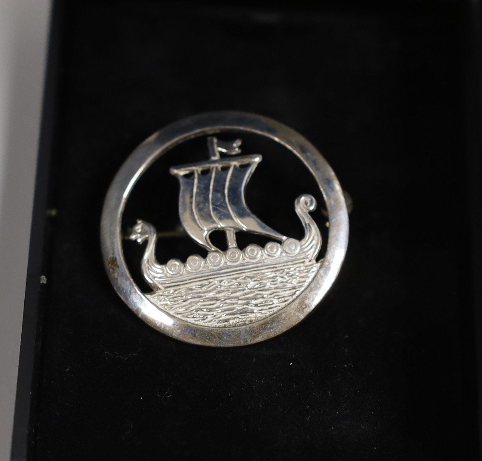 A Christian Dior costume rose brooch, 6cm, in box and a small group of sterling, white metal and costume jewellery, including Ortak Longship brooch.